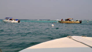 Boats anchored at snorkeling site