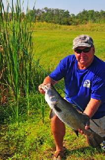 Ken Baker with Barramundi