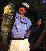 Larry Larsen with Peacock Bass